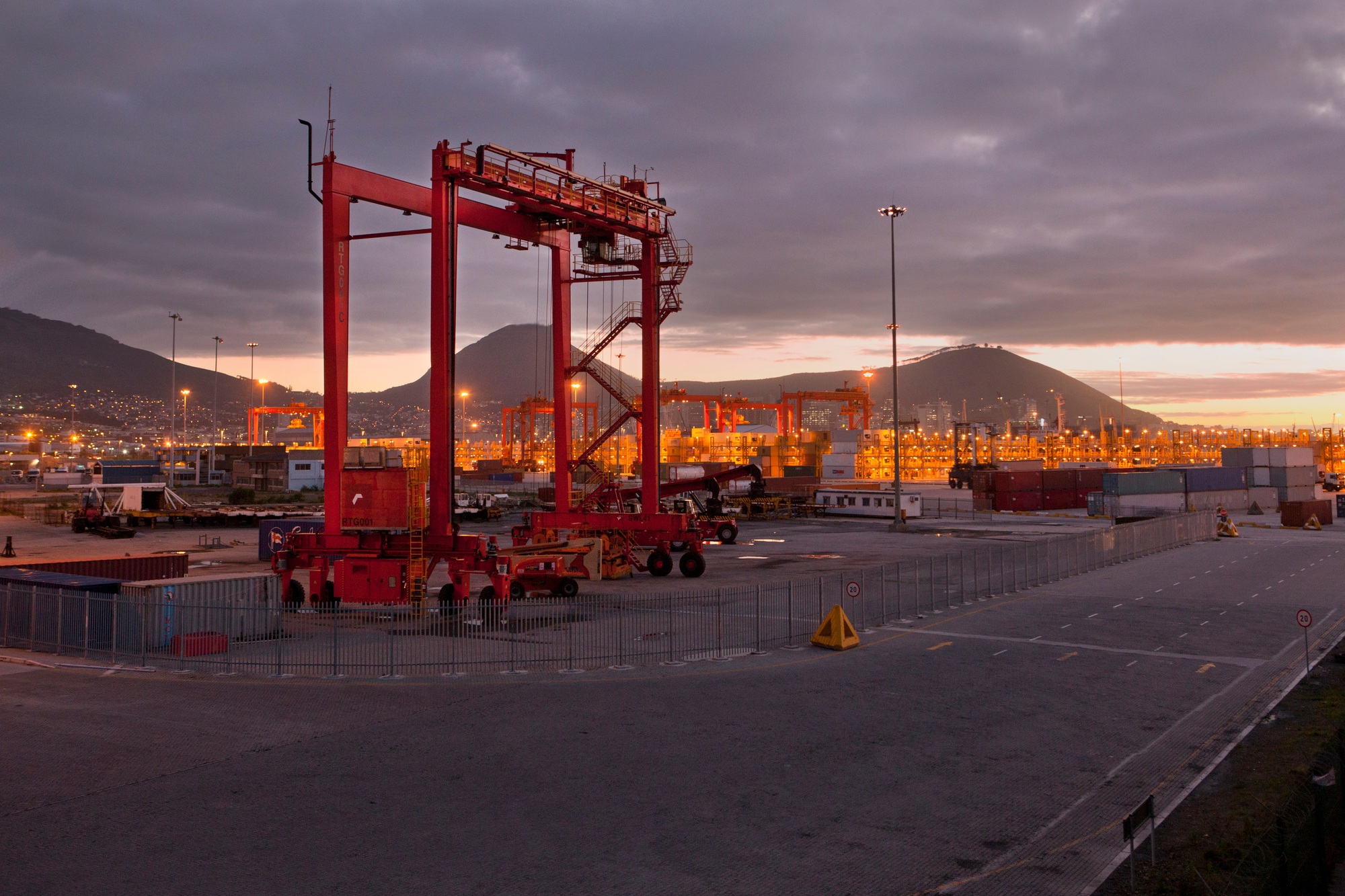 Cranes and containers in shipyard